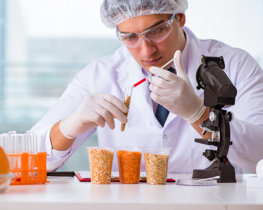 Scientist conducting sample analysis in a laboratory setting.