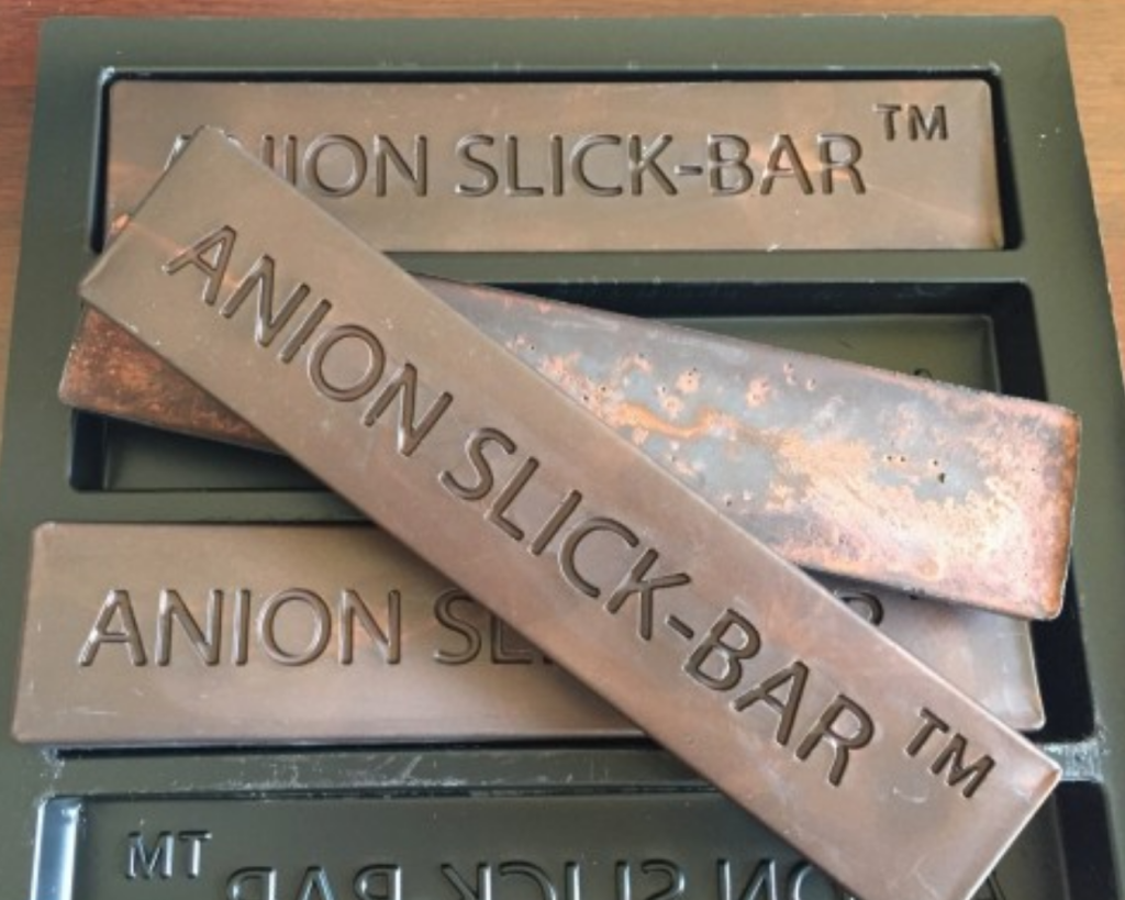Anion Slick-Bar solid lubricant bars designed for Rotary Kiln and Rotary Dryer lubrication applications in industrial plants.